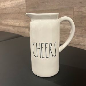 Rae Dunn cheers pitcher